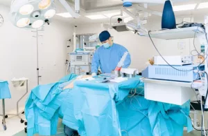 cosmetic surgeon in operating room suite